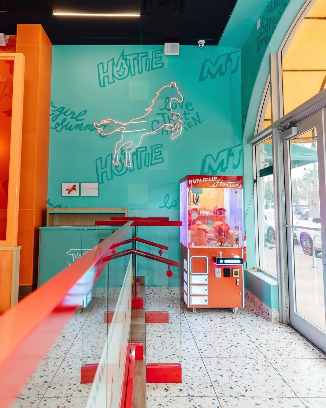 MEGAN THEE STALLION STANDS ON BUSINESS AS SHE OPENS HER FIRST POPEYES STORE IN MIAMI